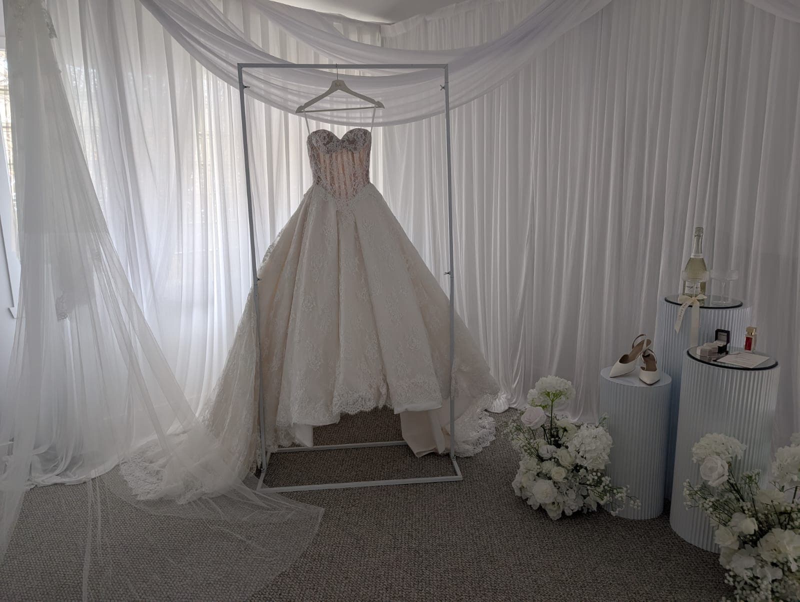 Bridal dress with curtain backdrop