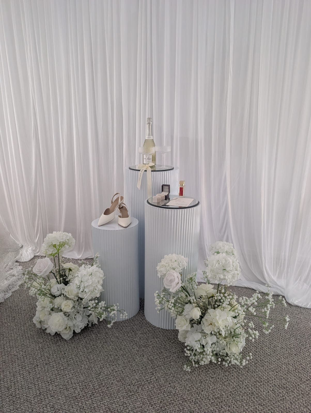 Bridal accessories on plinths