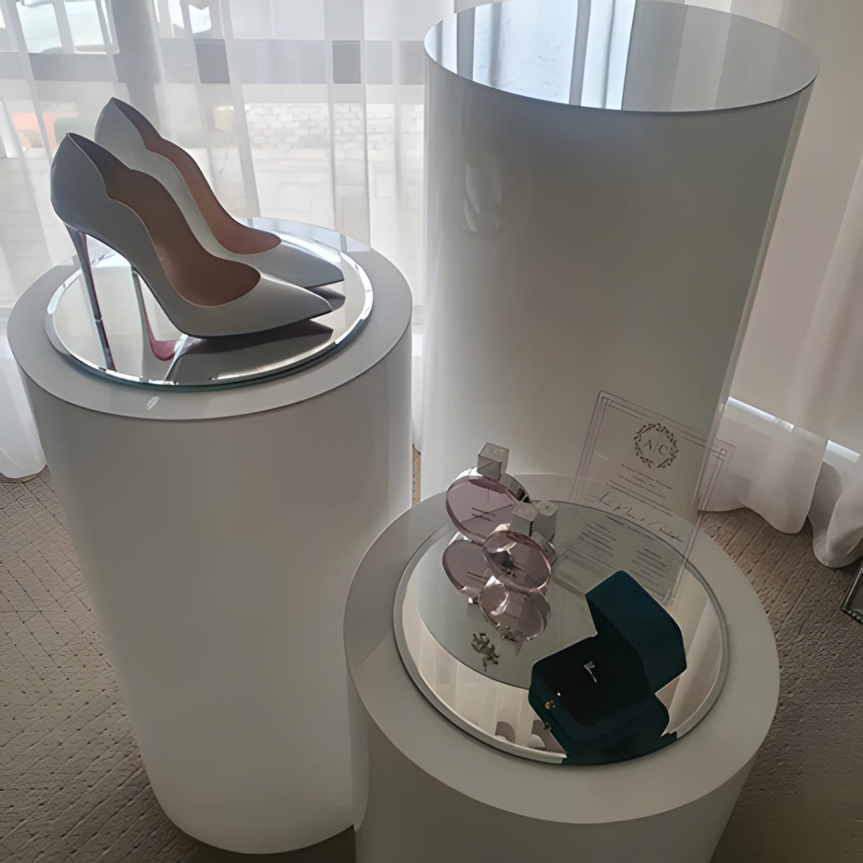 Round white acrylic plinth